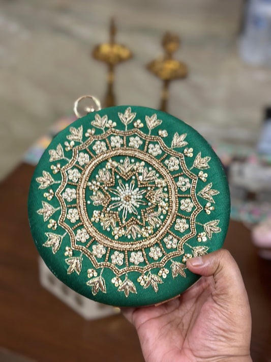 Mandala design embroidered clutch